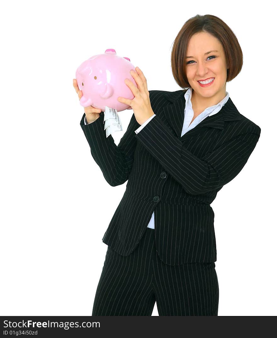 Excited female caucasian shaking her piggy bank with a lot of money come out. Excited female caucasian shaking her piggy bank with a lot of money come out