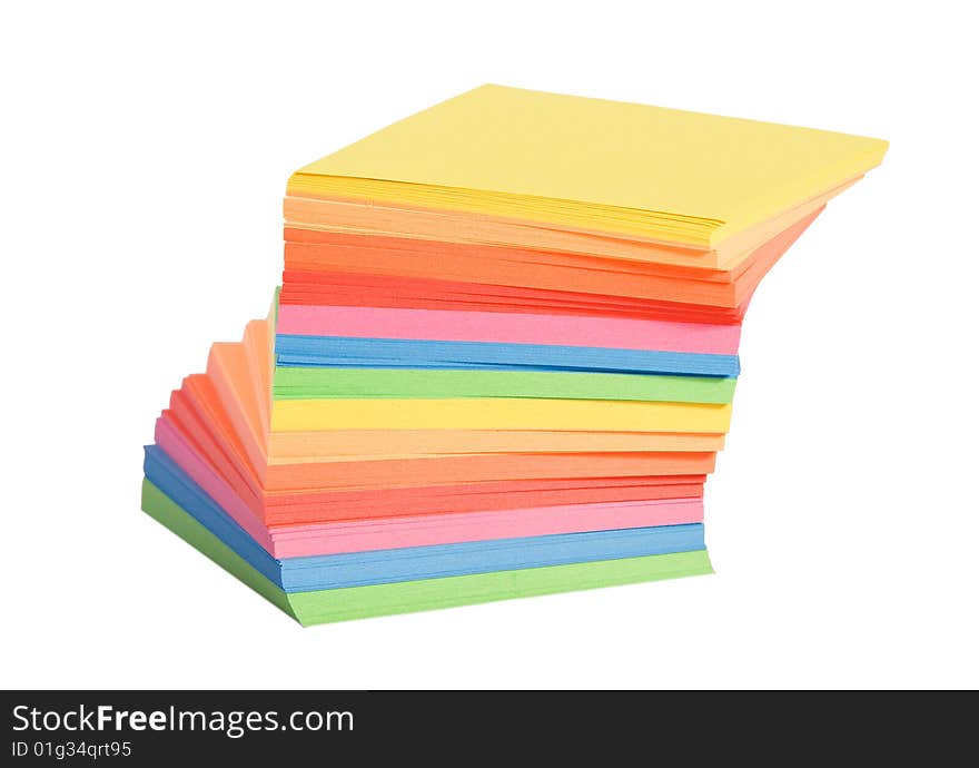 Stack of multicolored notes  on white background