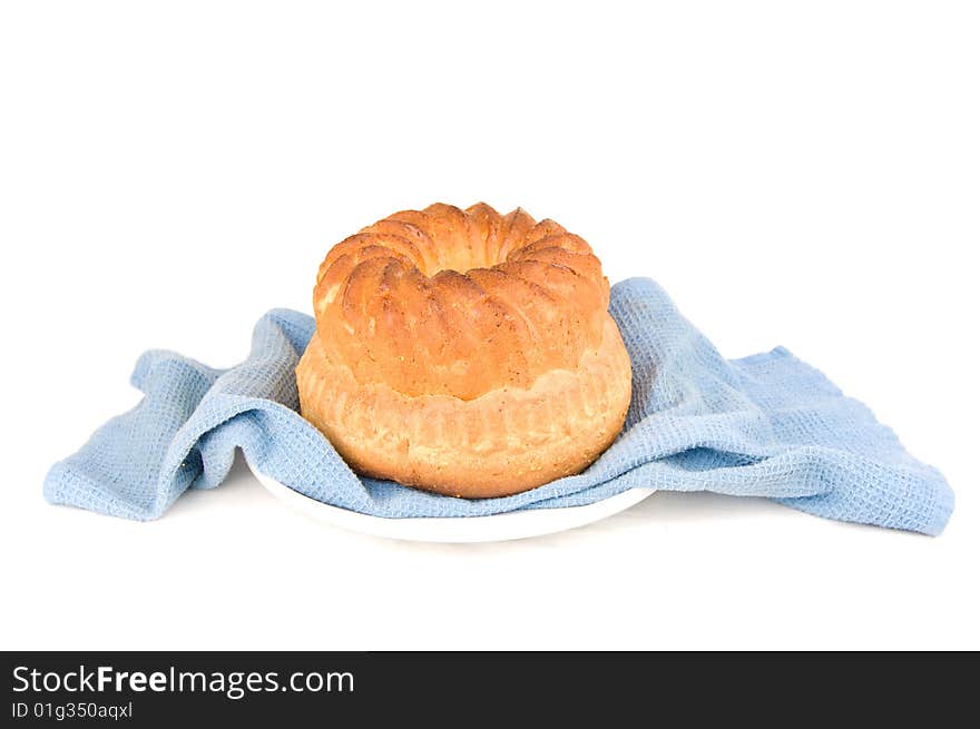 Fresh bread on a plate, isolated on white. Fresh bread on a plate, isolated on white