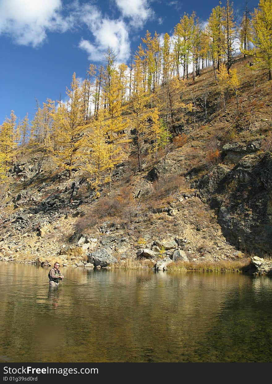 Fishing on river in Indian summer. Fishing on river in Indian summer