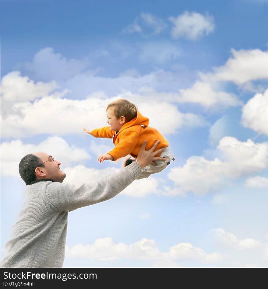 Flying child over sky background