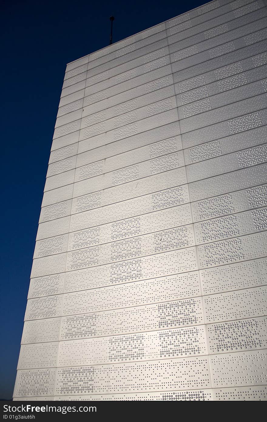 The building on top of the opera in downtown harbour oslo, Norway. The walls have a special kind of dotted pattern. The building on top of the opera in downtown harbour oslo, Norway. The walls have a special kind of dotted pattern