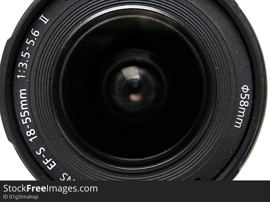 A  macro image of a photographic lens over white