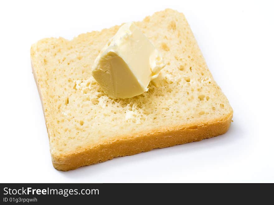 Stock photo: an image of yellow butter on a slice of bread. Stock photo: an image of yellow butter on a slice of bread