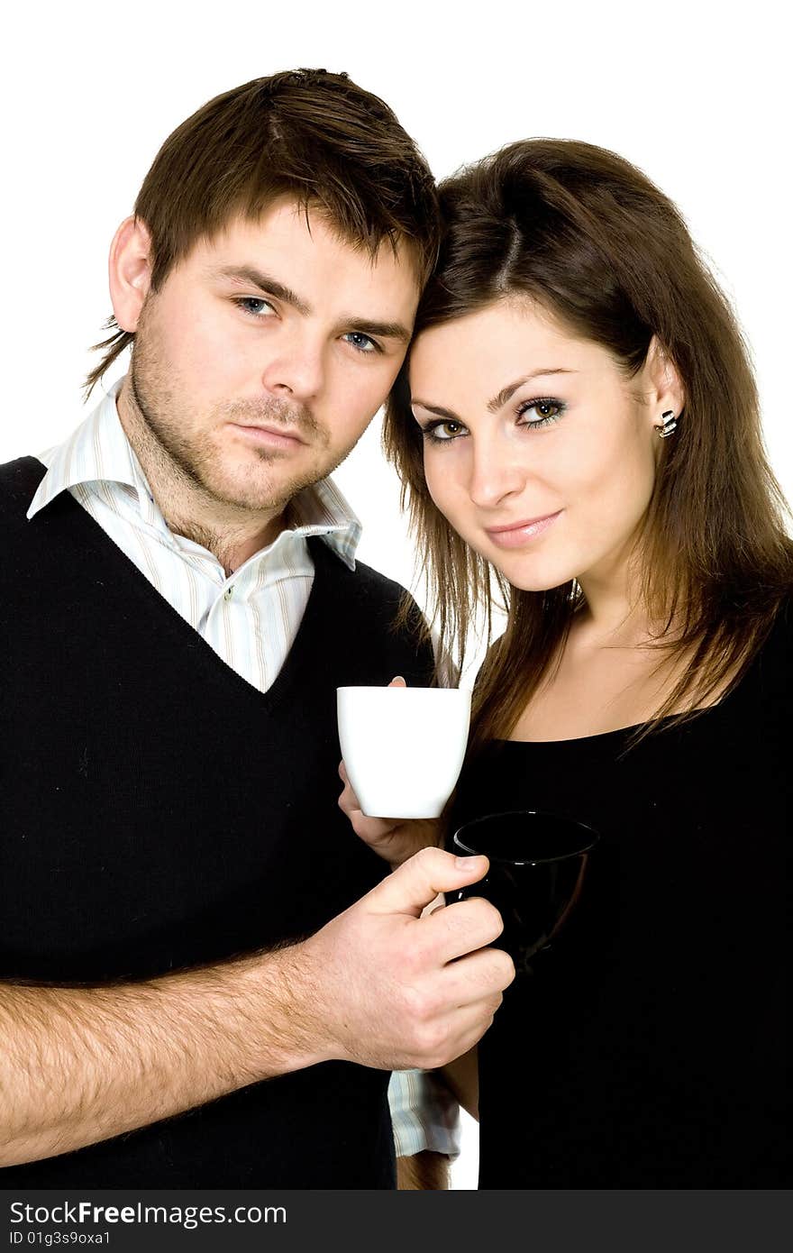 Stock photo: an image of a man and a woman with cups. Stock photo: an image of a man and a woman with cups