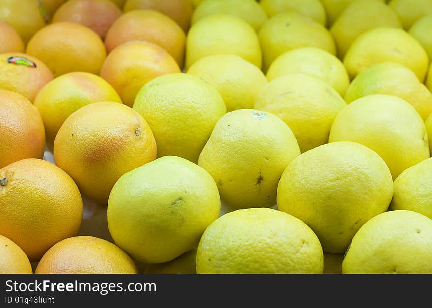 Fresh grapefruits displayed in a store