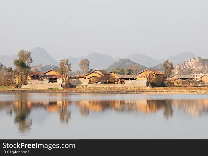 In the setting sun village, is tranquil and is beautiful