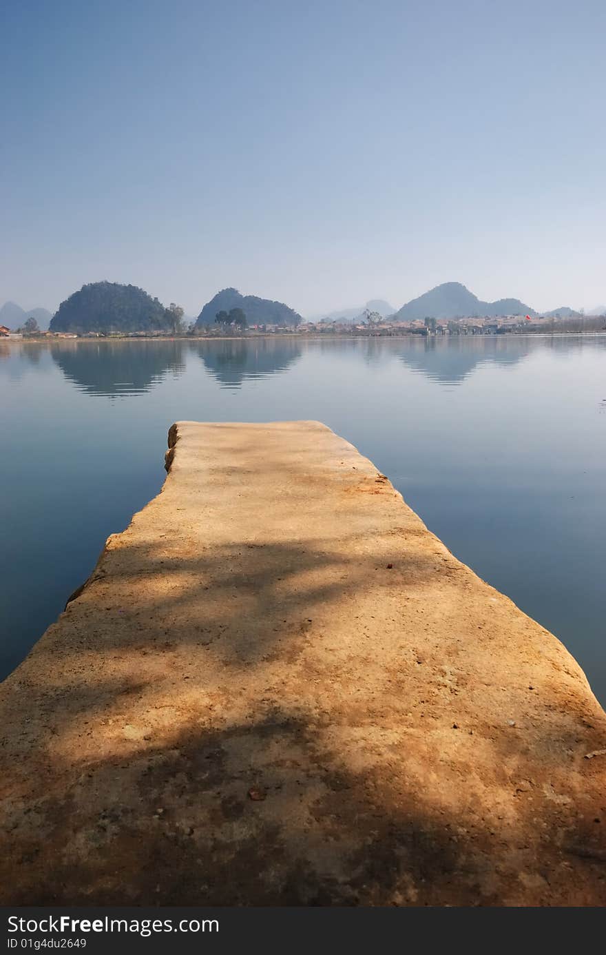 The brown color flagstone, extends to the blue color lake center