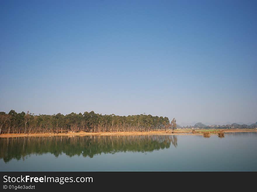 The woods in water inverted image, is an enchanting scenery