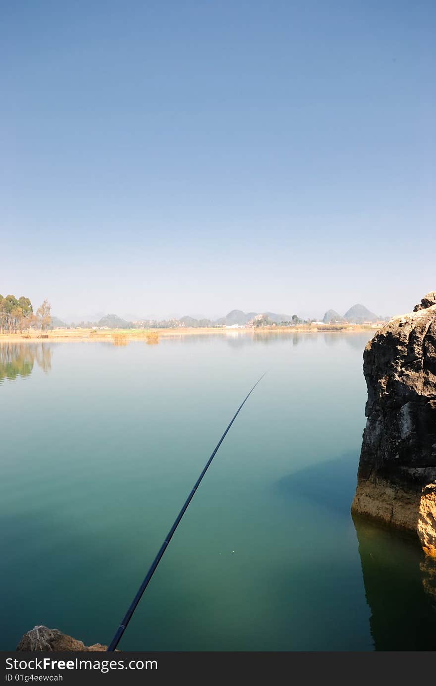 Fishes nearby the scenery beautiful lake water. Fishes nearby the scenery beautiful lake water