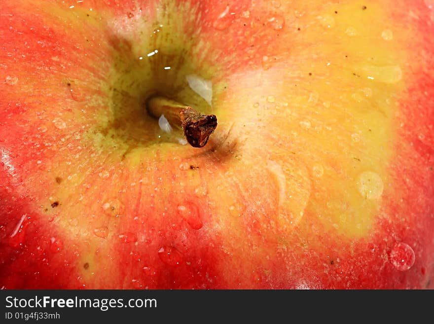 Red apple with drops of water. Red apple with drops of water.