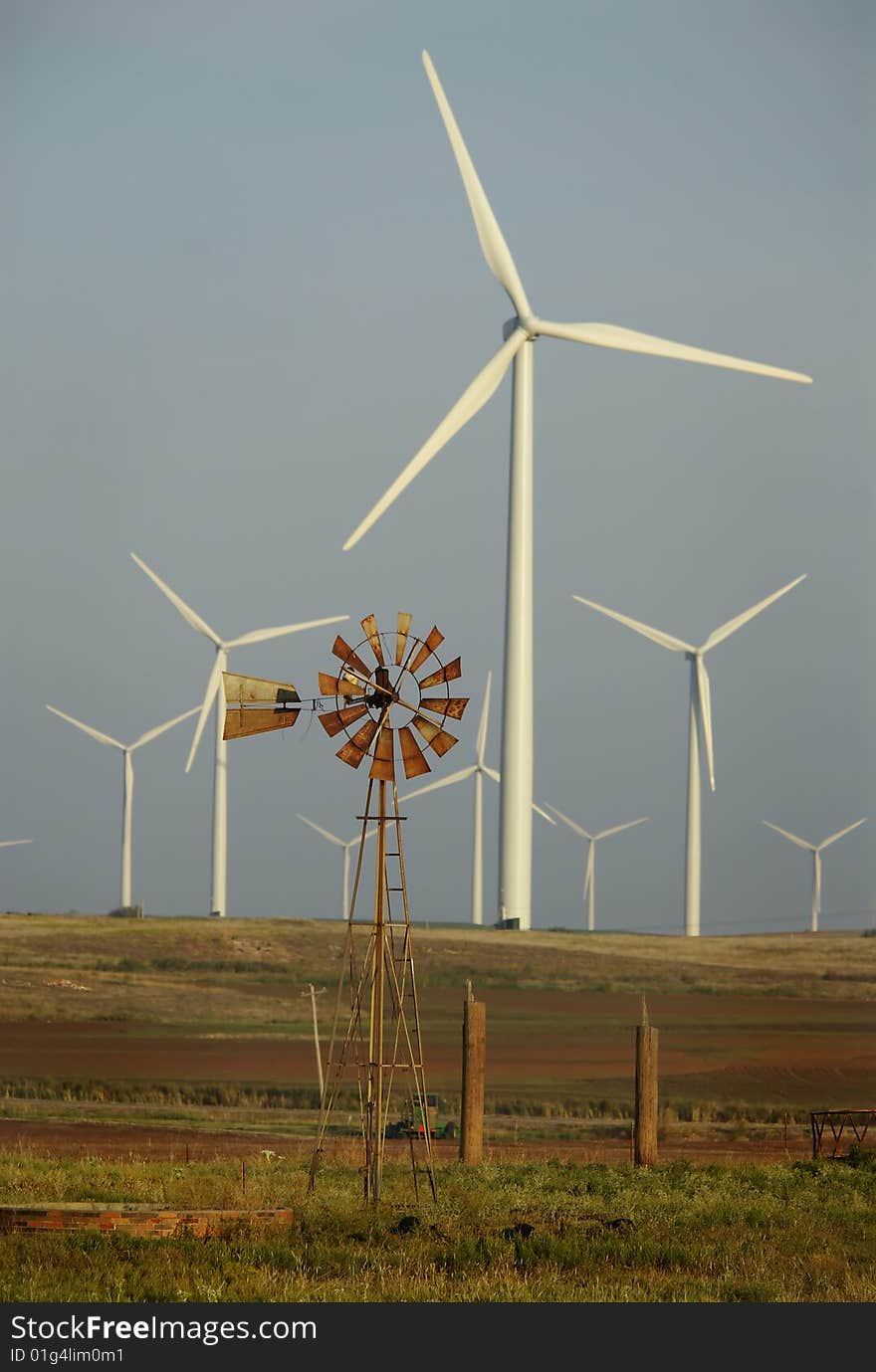 Windmill surrounded by wind turbines