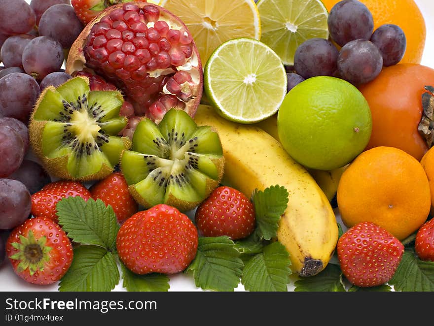 Bananas, kiwi grapes, pear, oranges, tangerines, lemons and strawberry. Bananas, kiwi grapes, pear, oranges, tangerines, lemons and strawberry