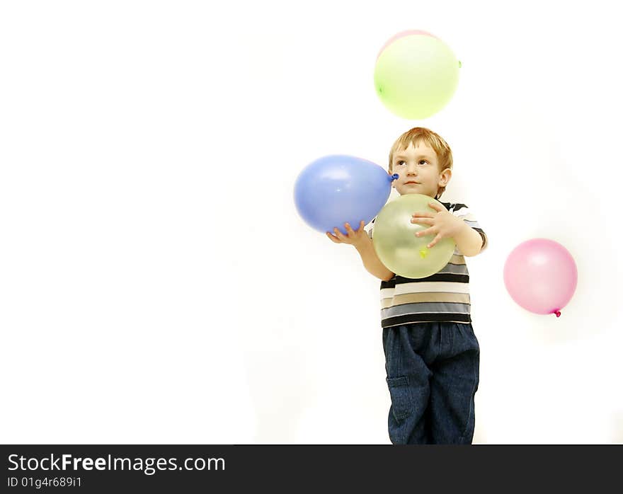 Boy with colorful balloons