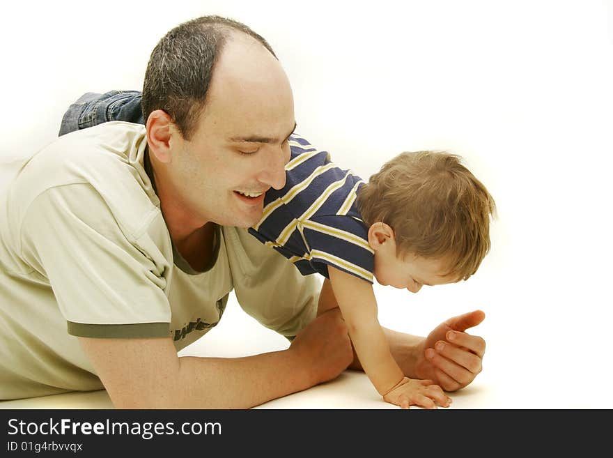 Father and son playing over white