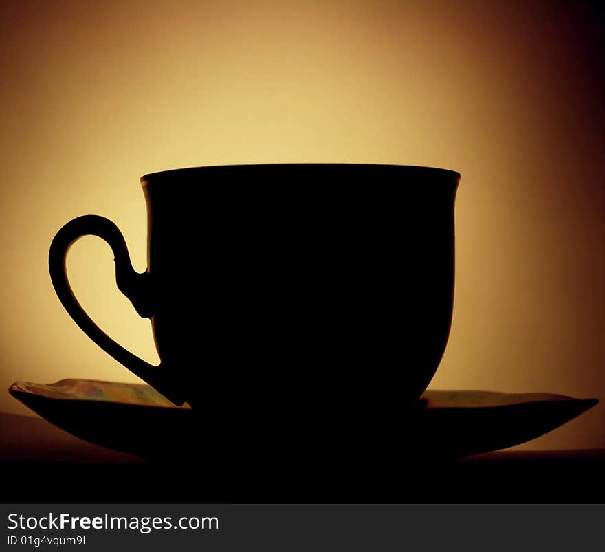 Coffee Cup In Backlight