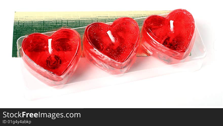 Row of red heart candles