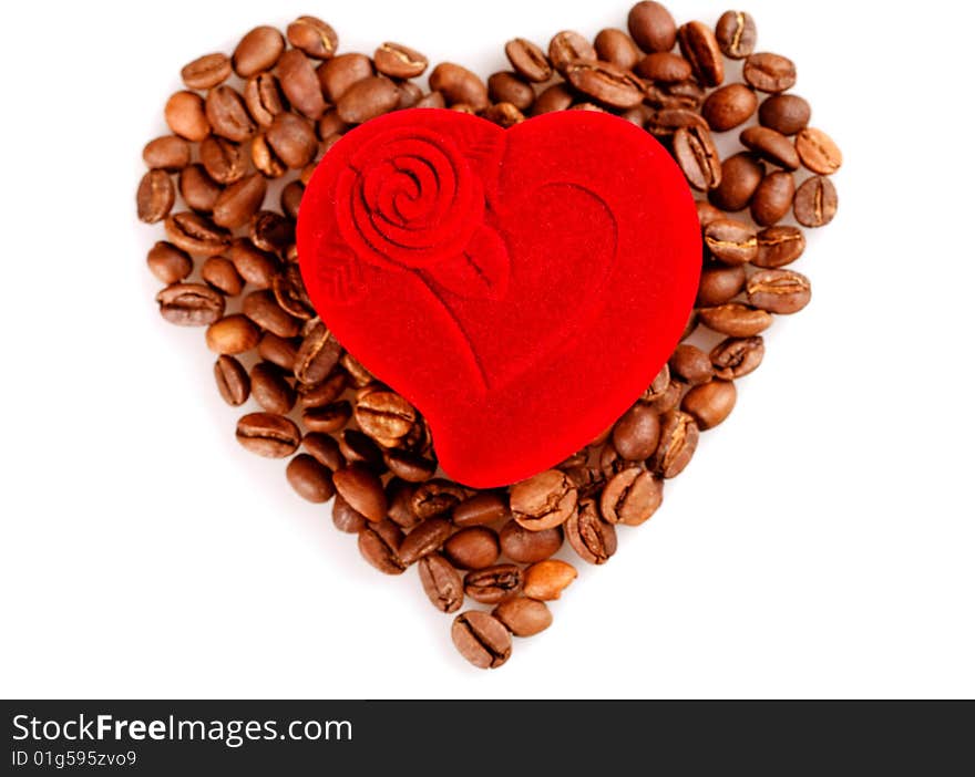 Red heart box on coffee beans. Red heart box on coffee beans