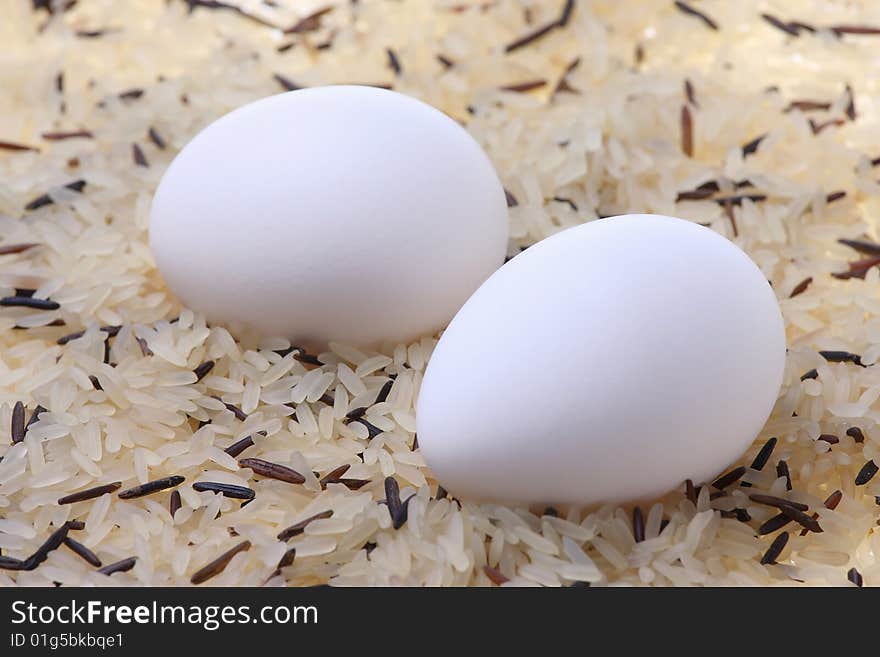 Eggs and rice are on the table. Eggs and rice are on the table.