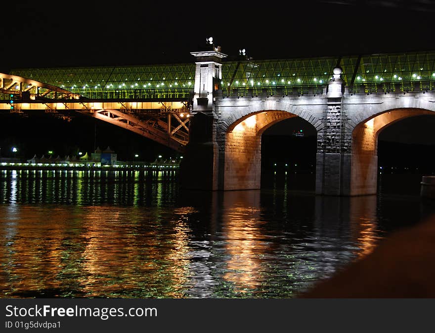 Drawbridge in St. Petersburg, river Neva, white nights, night cityscape