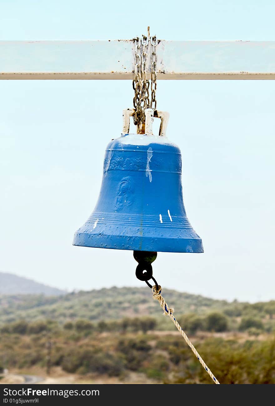 Old traditional bell hanging outside an orthodox church in Greece. Old traditional bell hanging outside an orthodox church in Greece