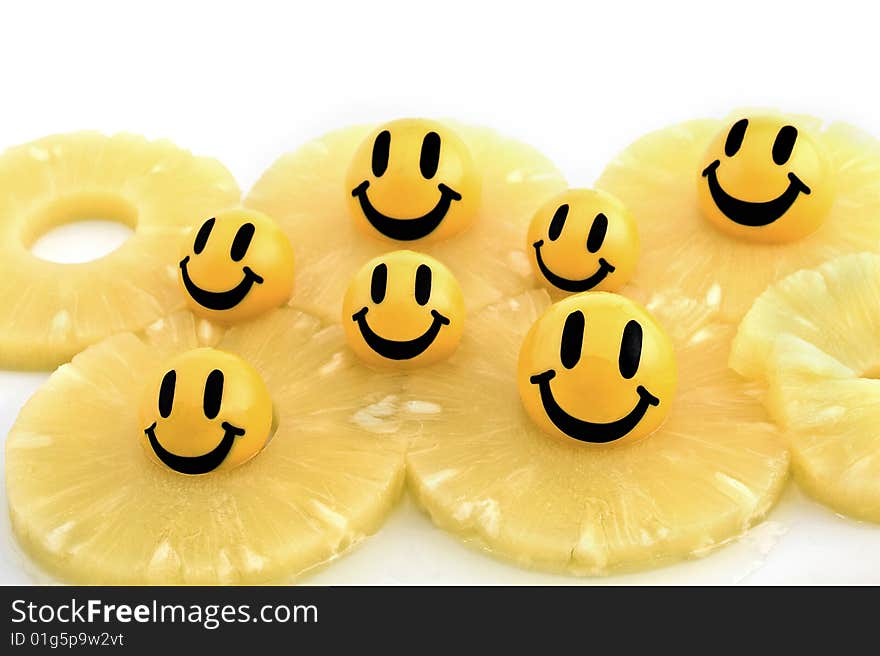 A smiling happy fruit on a white