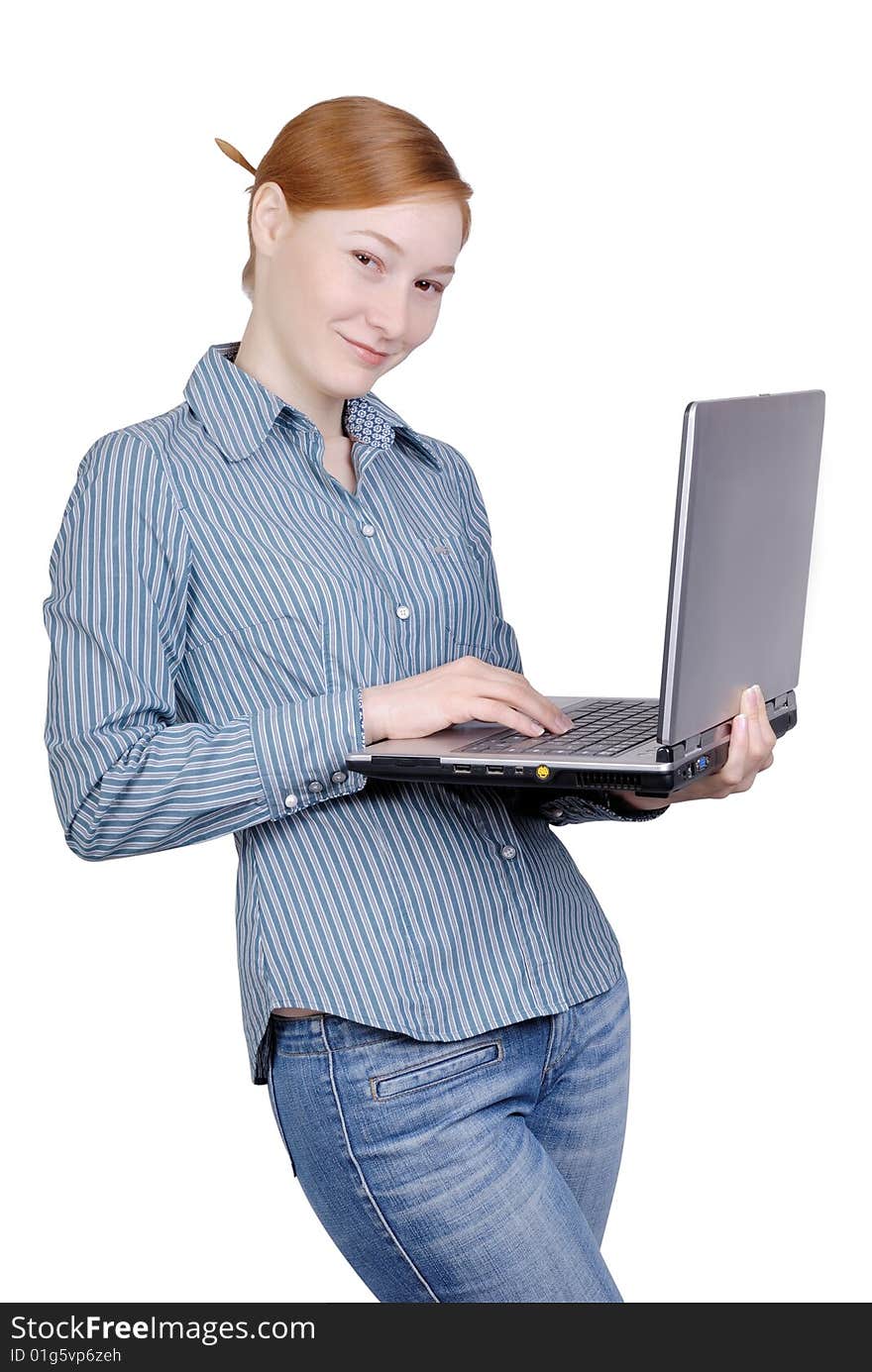 Young business woman with the laptop isolated on a white background