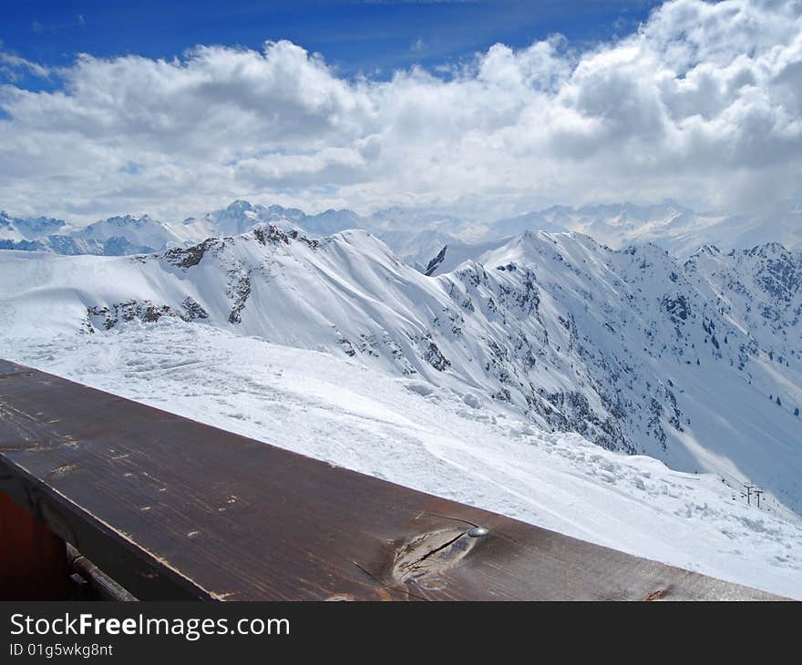 Sunny winter day in the European Alps. Picture was taken from Nebelhorn near Oberstdorf in Bavaria, Germany. Sunny winter day in the European Alps. Picture was taken from Nebelhorn near Oberstdorf in Bavaria, Germany.