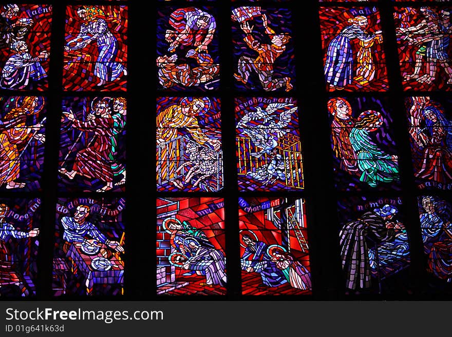 Colorful stained-glass window in St.Vitus cathedral in Czech capital Prague