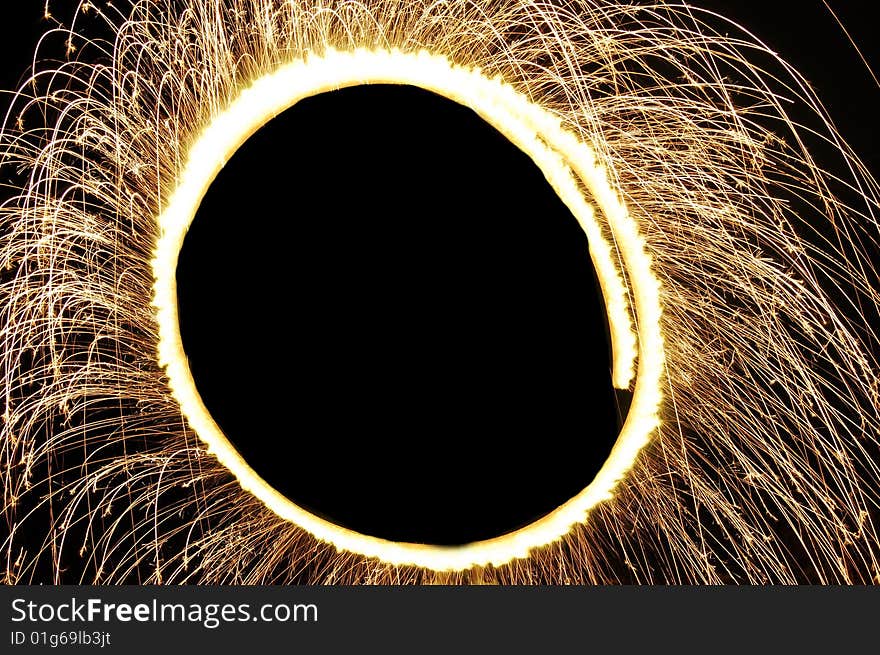 A glowing ring of sparks. A glowing ring of sparks.