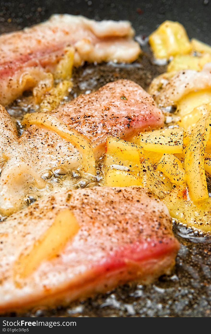 Pangasius filet frying with yellow peppers. Pangasius filet frying with yellow peppers