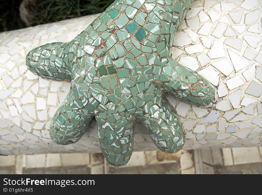 hand of the gecko in park guell. hand of the gecko in park guell