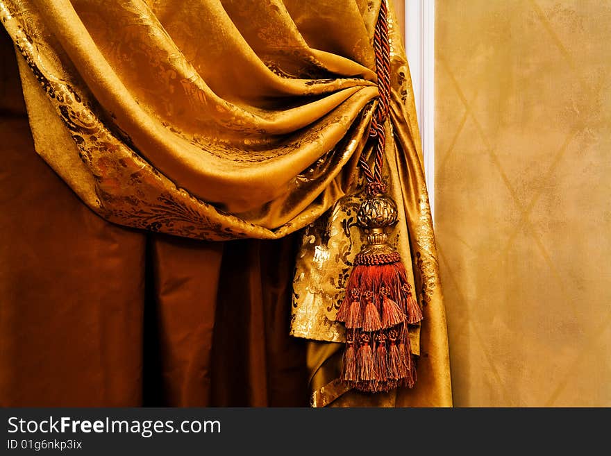 Curtain with an ornament in the modern apartment