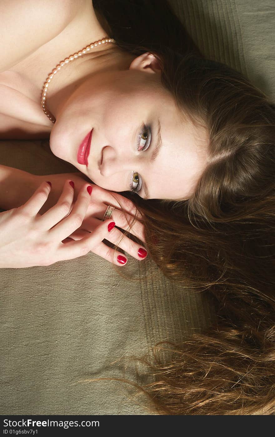 Smiling young woman with long red hair. Smiling young woman with long red hair