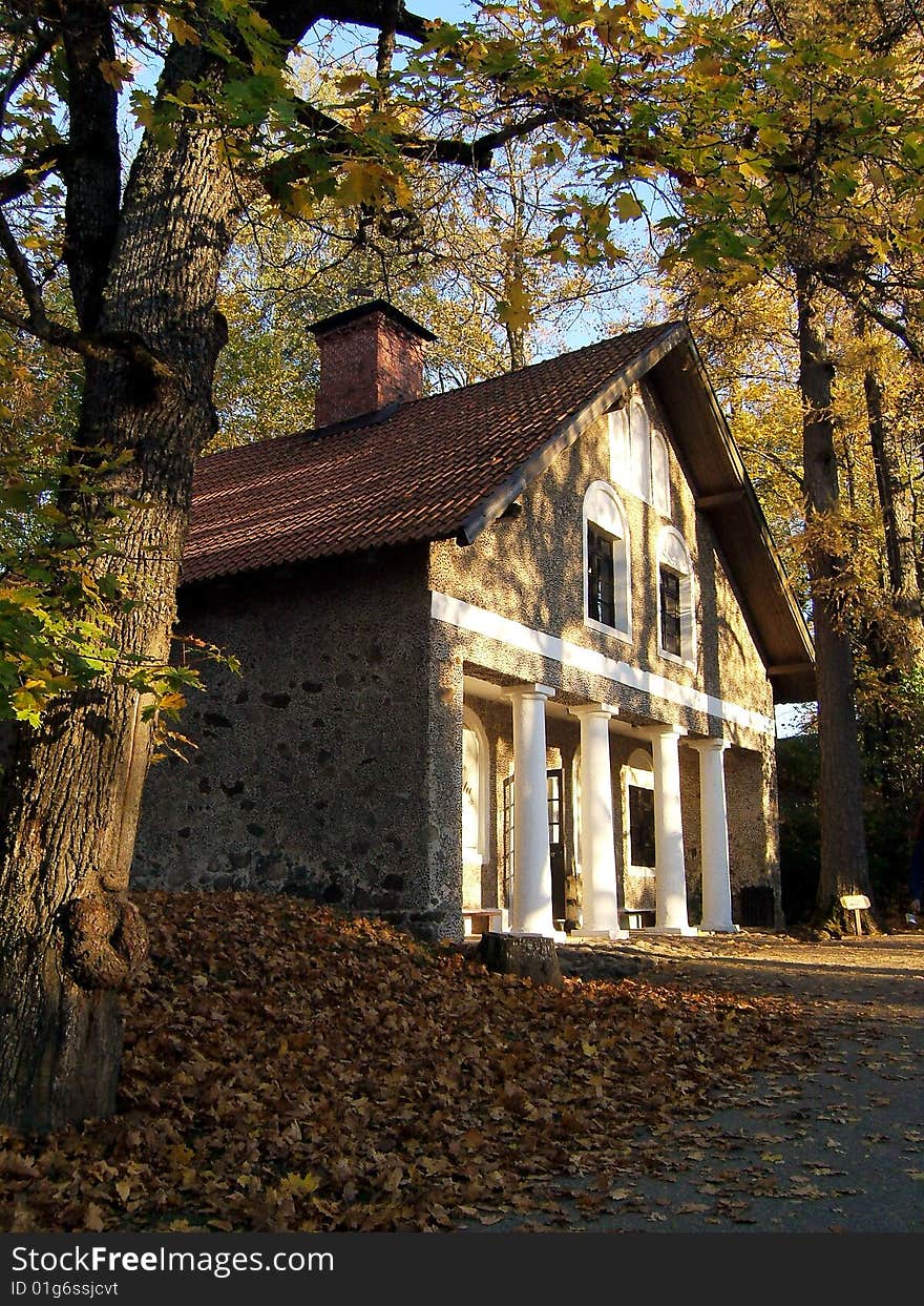 Photo of house with autumn nature.