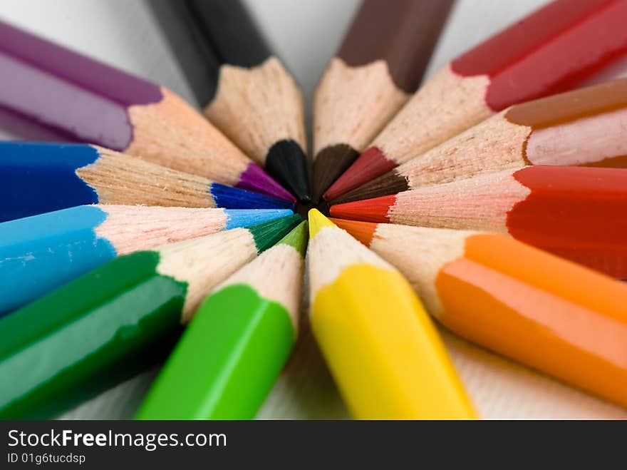 Colored pencils forming a circular shape