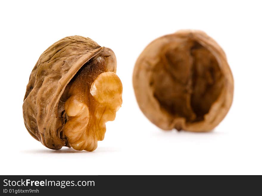 Broken walnut on white background