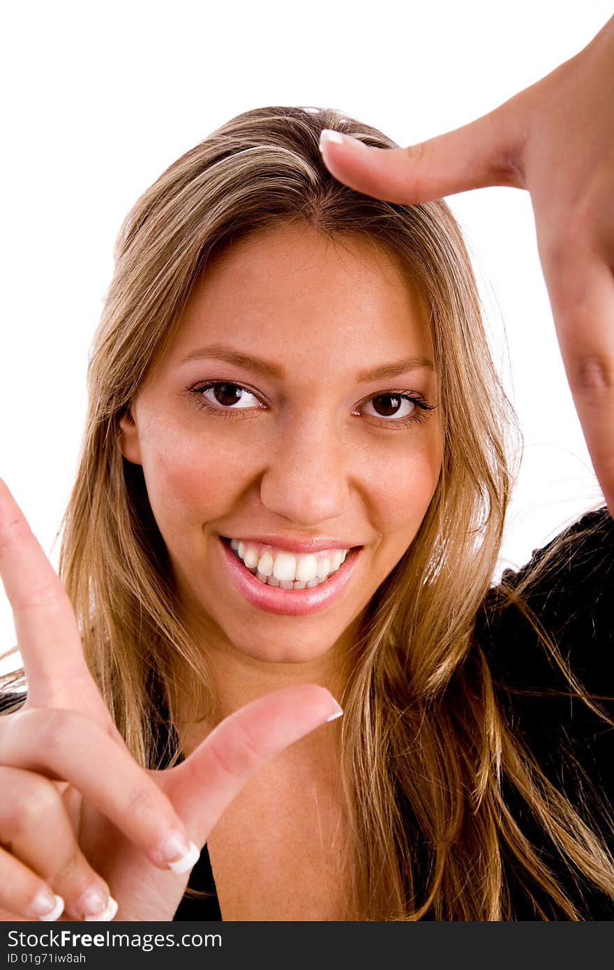 Woman biting her finger and looking sideways