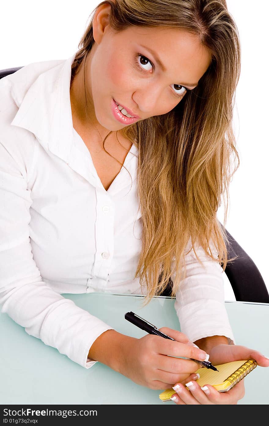 Portrait of young professional looking at camera with white background