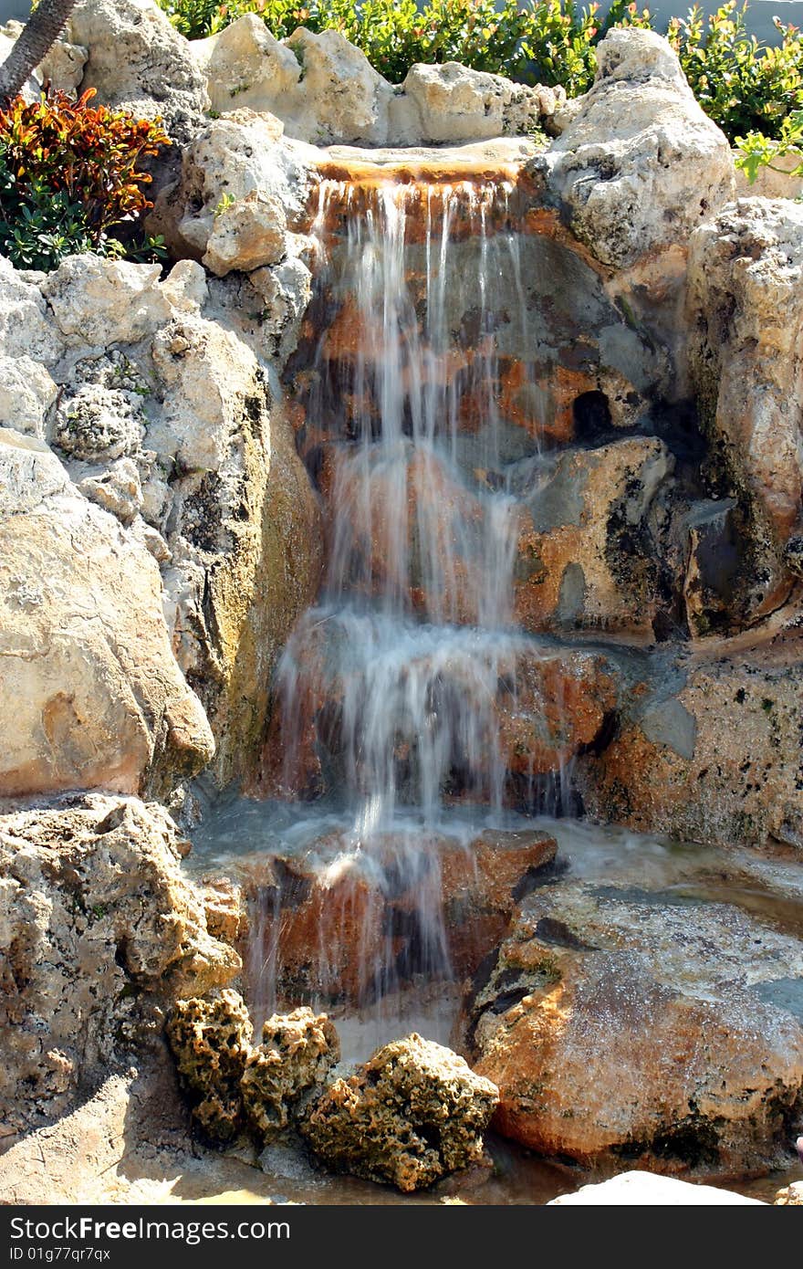 Water rushing down some rocks. Water rushing down some rocks.