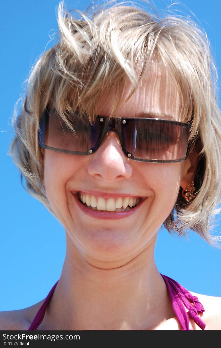 Gorgeous girl smiling at the beach. Gorgeous girl smiling at the beach