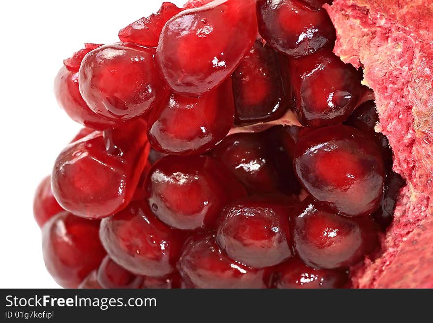 Grains of ripe pomegranate. Fruit.