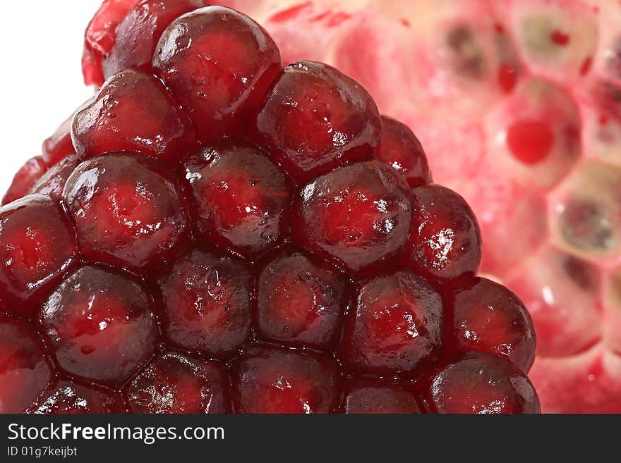 Grains of ripe pomegranate. Fruit.