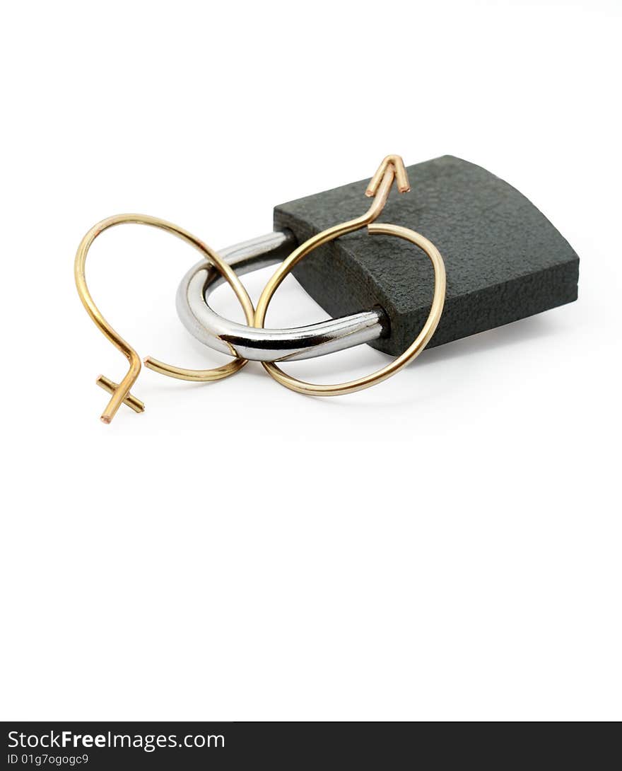 Male and female signs made from wire fastened with lock. Male and female signs made from wire fastened with lock