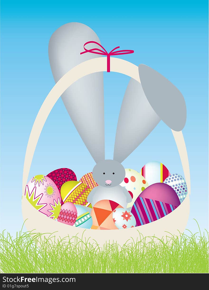 Easter bunny with eggs in basket