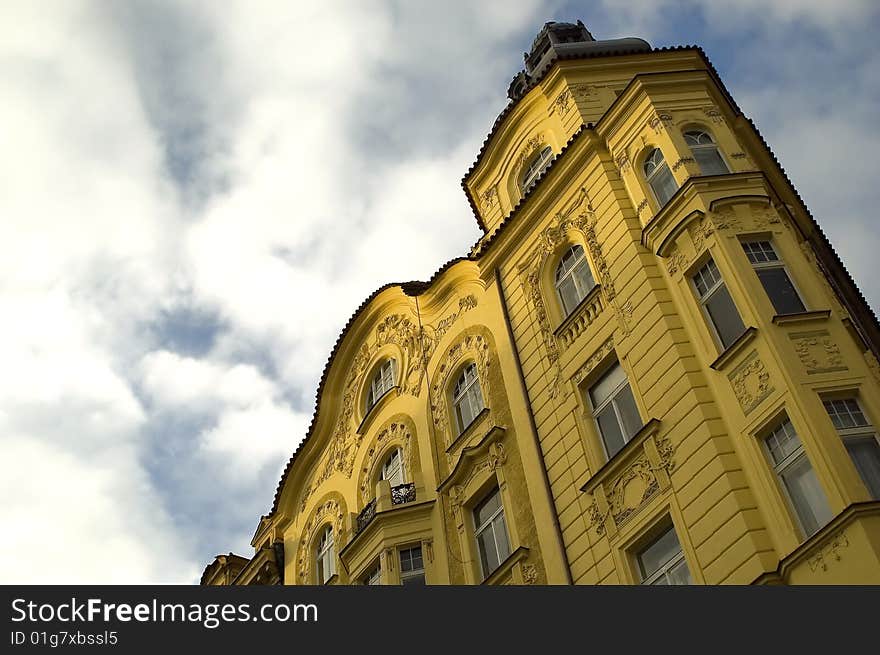 A yellow palace in the blue sky