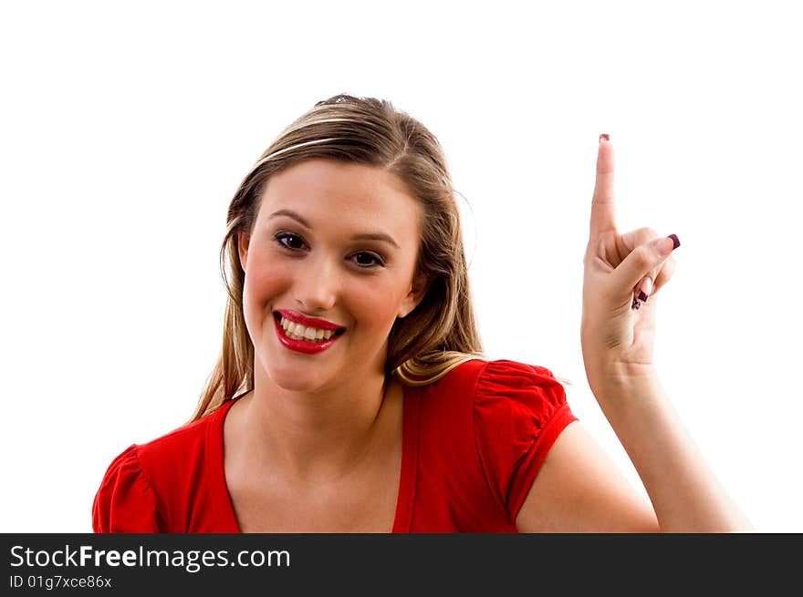 Woman biting her finger and looking sideways