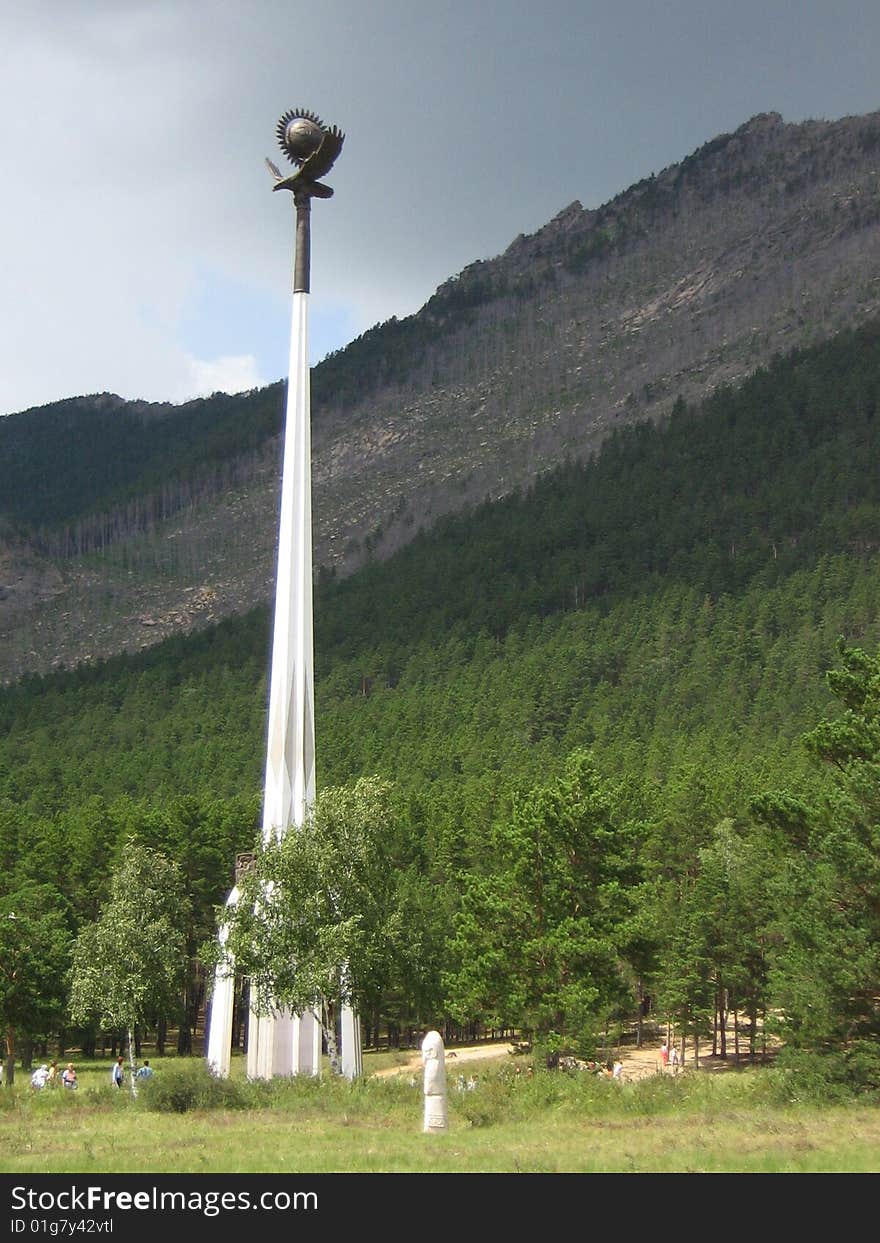 The monument of the eagle in the mountain covered by forest