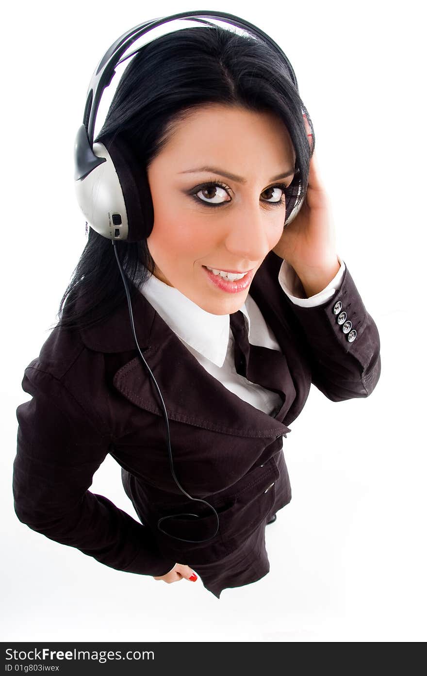 Young accountant holding headphone on an isolated white background