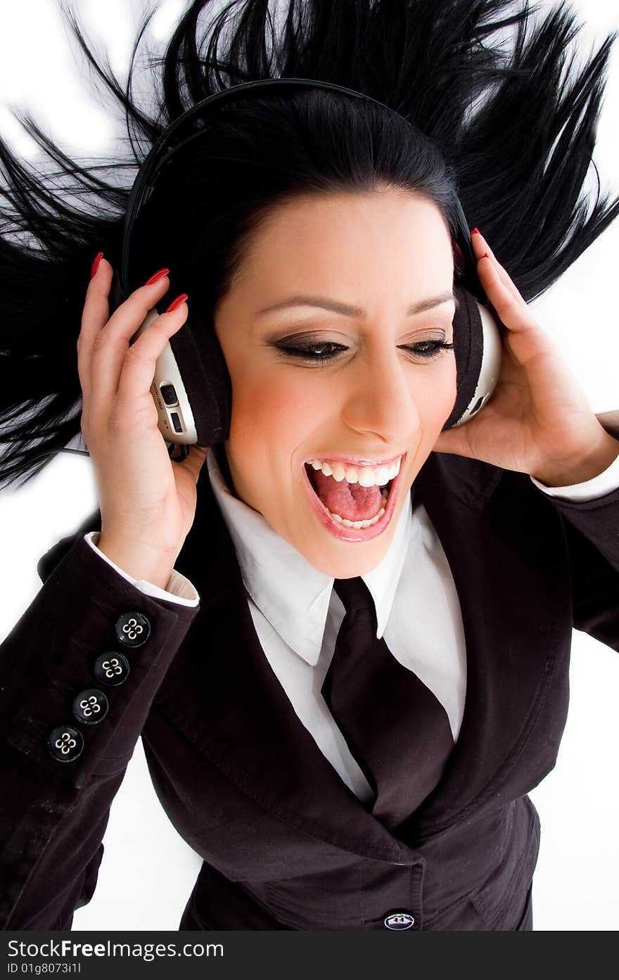 Young executive wearing headphone with white background